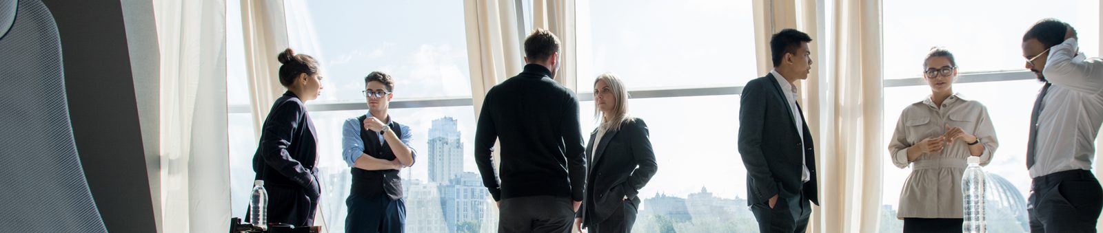 A team in conversation in a meeting room